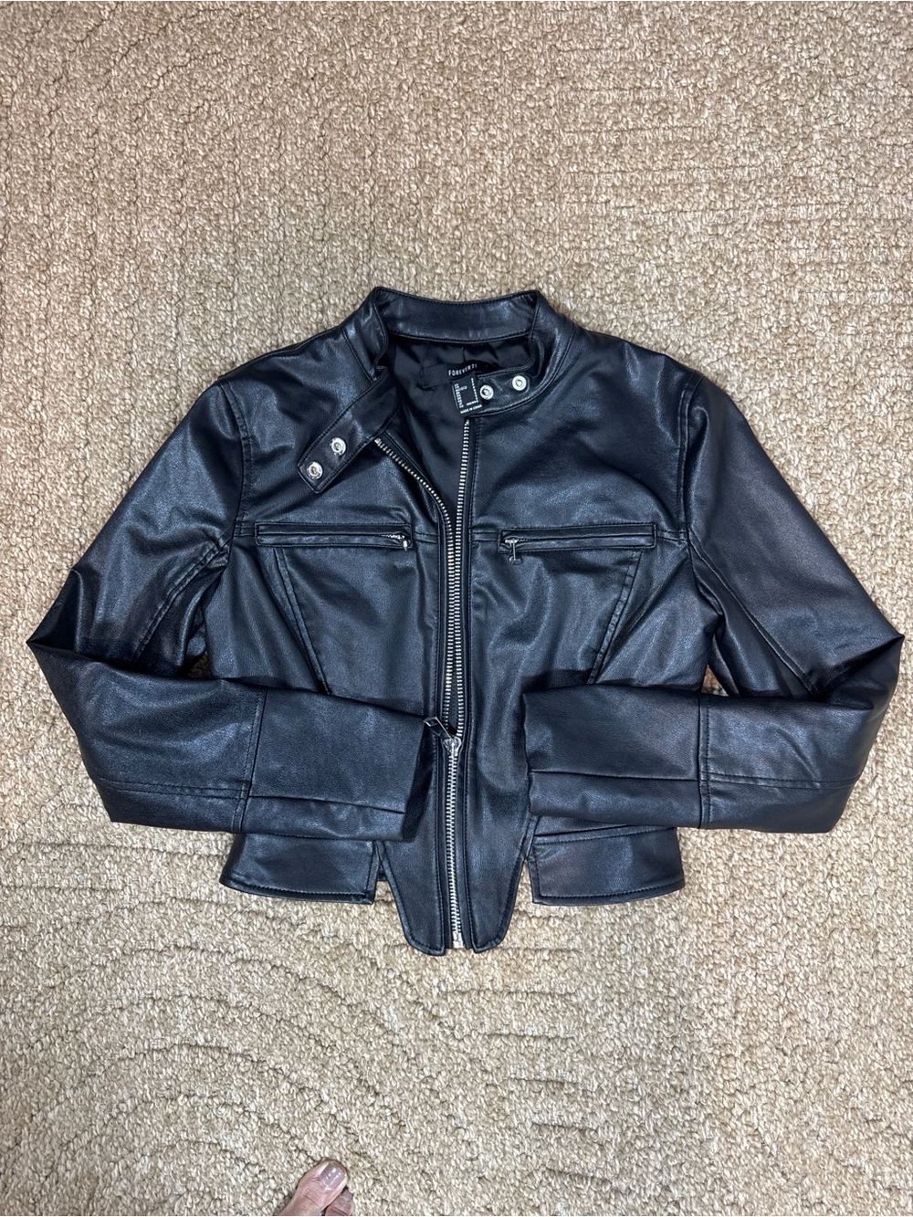 ✨ Level up your wardrobe with this edgy, head-turning, slick black faux leather